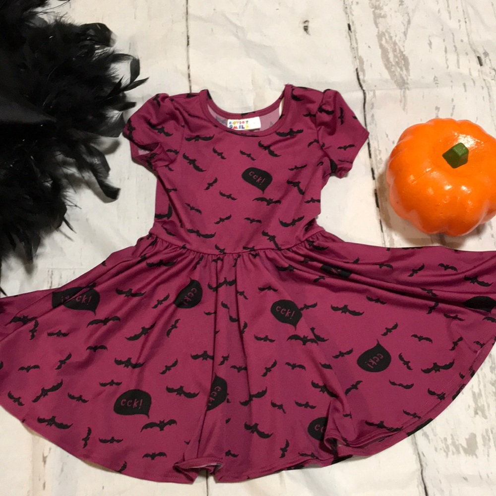 Eek! It’s a bat cap sleeve full circle dress!